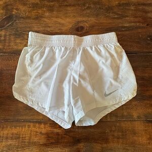 Nike Women's White Athletic Shorts with Silver Logo